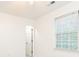 Bright bedroom with natural light, window with blinds and white walls at 535 Silver Pine Trl, Roswell, GA 30076