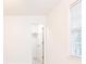 Bright bedroom with natural light, closet, and white walls at 535 Silver Pine Trl, Roswell, GA 30076