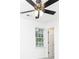 Well-lit room with a ceiling fan and a view through a window at 535 Silver Pine Trl, Roswell, GA 30076