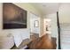 Welcoming foyer with hardwood floors, stairs, and a view of other rooms at 535 Silver Pine Trl, Roswell, GA 30076