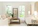 Cozy living room featuring white furniture, a ladder with blanket, and bright windows at 535 Silver Pine Trl, Roswell, GA 30076