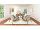 Bright living room featuring hardwood floors, a comfortable seating area and natural light at 535 Silver Pine Trl, Roswell, GA 30076