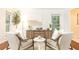 Inviting living room with natural light, two chairs, and a stylish desk setup at 535 Silver Pine Trl, Roswell, GA 30076