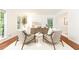 Bright living room with modern furniture, white walls, and large windows at 535 Silver Pine Trl, Roswell, GA 30076