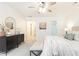 Spacious bedroom with plush carpet, modern lighting, and a walk-in closet at 535 Silver Pine Trl, Roswell, GA 30076