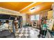 Functional basement space with checkerboard floors, closet and storage, plus a treadmill at 4882 Rock Haven Sw Dr, Lilburn, GA 30047