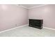 Bright, carpeted bedroom with a large bureau against the wall, offering ample storage at 4882 Rock Haven Sw Dr, Lilburn, GA 30047