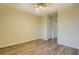This bedroom boasts modern flooring, neutral-colored walls, and natural light, creating a relaxing and inviting space at 116 Laurel Ln, Social Circle, GA 30025