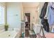 Bathroom with a soaking tub, walk-in closet and sink at 152 Ridge Xing, Temple, GA 30179