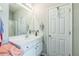 Well-lit bathroom features a modern vanity and shower at 152 Ridge Xing, Temple, GA 30179