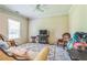 Comfortable bedroom featuring a plush rug, neutral walls, and natural light at 152 Ridge Xing, Temple, GA 30179