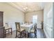 Formal dining area with elegant chandelier lighting and sophisticated trim work offers an inviting atmosphere at 152 Ridge Xing, Temple, GA 30179