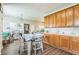 Eat-in kitchen offers ample counter space, great natural light, and blends functionality with dining at 152 Ridge Xing, Temple, GA 30179