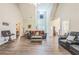 Bright living room with high ceilings, hardwood floors, and an open layout for entertaining at 152 Ridge Xing, Temple, GA 30179