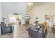Spacious living room featuring high ceilings, a stone fireplace, and comfortable seating at 152 Ridge Xing, Temple, GA 30179