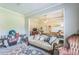 Comfortable living room with a glimpse into the bedroom, blending relaxation and private space at 152 Ridge Xing, Temple, GA 30179