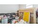 This living room is currently being used for storage and is cluttered with boxes, furniture, and other household items at 152 Ridge Xing, Temple, GA 30179
