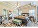 Spacious main bedroom features a tray ceiling, ensuite bathroom, and natural light at 152 Ridge Xing, Temple, GA 30179