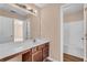 Neutral bathroom with vanity, framed mirror, and combination tub and shower at 362 Interlake Pass, Mcdonough, GA 30252