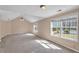 Large bedroom with neutral carpet, high vaulted ceilings, and many windows at 362 Interlake Pass, Mcdonough, GA 30252