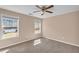 Cozy bedroom with neutral tones, featuring two large windows providing natural light at 362 Interlake Pass, Mcdonough, GA 30252