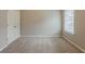 Bedroom with carpet, double-door closet, and natural light at 4139 Kensington Cv, Atlanta, GA 30349