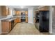 Spacious kitchen featuring stainless steel appliances and wooden cabinetry at 4139 Kensington Cv, Atlanta, GA 30349