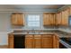 Kitchen featuring wooden cabinets and stainless steel sink at 4139 Kensington Cv, Atlanta, GA 30349