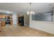 Open kitchen with stainless steel appliances and tile flooring at 4139 Kensington Cv, Atlanta, GA 30349