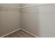 Carpeted walk-in closet with wire shelving at 4139 Kensington Cv, Atlanta, GA 30349
