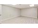 Unfinished basement area with light colored wood-look floors and neutral paint, ready for customization at 415 Collegiate Dr, Powder Springs, GA 30127