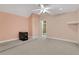 Bedroom with carpet and light pink walls at 1020 Riverside Rd, Roswell, GA 30076