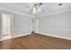 View of bedroom with ceiling fan showing entry to another room at 1020 Riverside Rd, Roswell, GA 30076