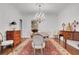 Elegant dining room featuring a chandelier, hardwood floors and classic decor at 1020 Riverside Rd, Roswell, GA 30076