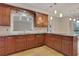A gourmet kitchen with granite countertops, stainless steel appliances and hardwood floors at 1020 Riverside Rd, Roswell, GA 30076