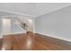 Bright living room with hardwood floors and staircase at 1020 Riverside Rd, Roswell, GA 30076