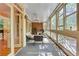 A sunroom with lots of windows and seating at 1020 Riverside Rd, Roswell, GA 30076
