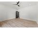Minimalist bedroom featuring wood floors, and a ceiling fan at 267 Green Hill Rd, Sandy Springs, GA 30042