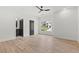 Bedroom featuring wood floors, large windows and a ceiling fan at 267 Green Hill Rd, Sandy Springs, GA 30042