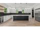Modern kitchen equipped with stainless steel appliances and a functional kitchen island at 267 Green Hill Rd, Sandy Springs, GA 30042