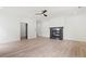 Living room with wood floors and a modern fireplace at 267 Green Hill Rd, Sandy Springs, GA 30042