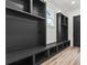 Well-organized mudroom with built-in storage, benches, and natural light at 267 Green Hill Rd, Sandy Springs, GA 30042