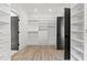 Bright walk-in closet boasts built-in shelves and storage, offering ample space for clothes and accessories at 267 Green Hill Rd, Sandy Springs, GA 30042