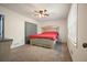 Bedroom with plush carpet, ceiling fan, and light neutral walls at 408 Walnut Dr, Woodstock, GA 30189