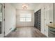 Cozy breakfast nook with hardwood flooring, large windows, and natural light at 408 Walnut Dr, Woodstock, GA 30189