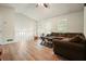 Open living area with wood-look vinyl floors, vaulted ceiling, and neutral paint at 408 Walnut Dr, Woodstock, GA 30189