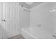 A clean and modern bathroom with white tiled walls and updated fixtures at 6851 Roswell Rd # C7, Atlanta, GA 30328
