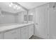A modern bathroom featuring tiled floors and shower and a white vanity at 6851 Roswell Rd # C7, Atlanta, GA 30328
