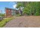 Charming multi-Gathering building with Tudor-style accents and mature trees in a serene, wooded setting at 6851 Roswell Rd # C7, Atlanta, GA 30328