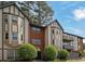 Lovely multi-Gathering residential exterior displaying a two-story facade with a charming brick accent and manicured greenery at 6851 Roswell Rd # C7, Atlanta, GA 30328